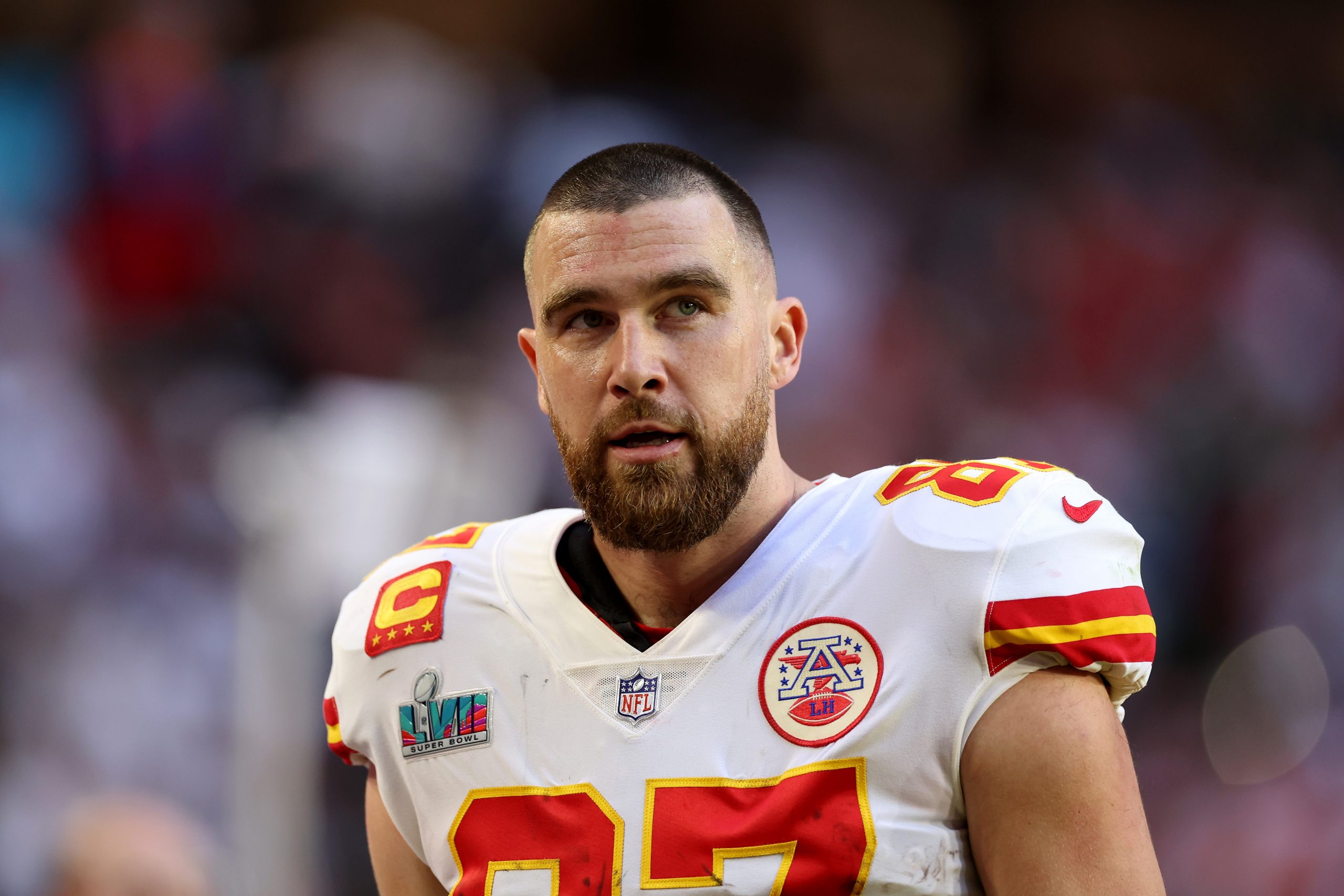 GLENDALE, ARIZONA - FEBRUARY 12: Travis Kelce #87 of the Kansas City Chiefs looks on against the Ph...