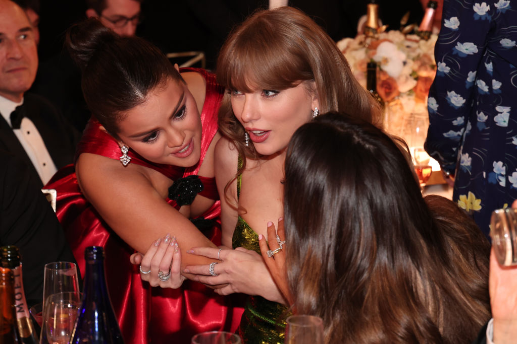 Selena Gomez and Taylor Swift at the 81st Golden Globe Awards held at the Beverly Hilton Hotel on J...