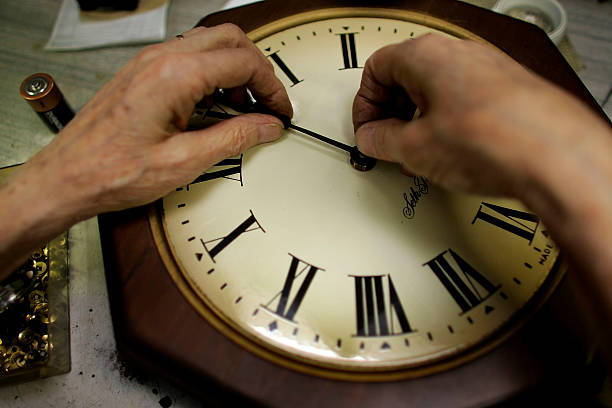 PLANTATION, FL - MARCH 06:  Howard Brown repairs a clock at Brown?s Old Time Clock Shop March 6, 20...