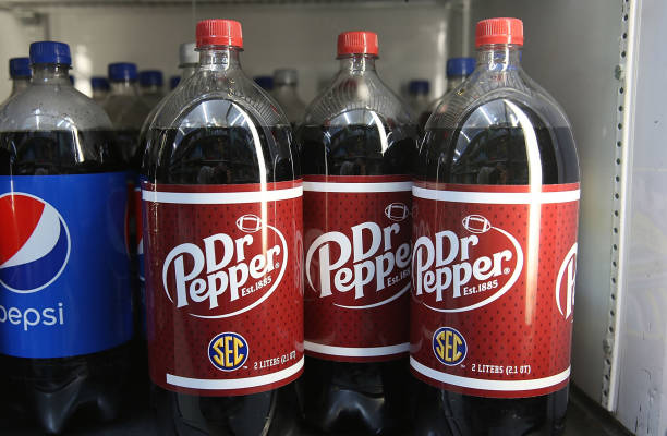 MIAMI, FL - JANUARY 29:  Bottles of Dr Pepper drinks are seen on a store shelf on the day Keurig Gr...