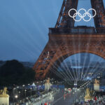 PARIS, FRANCE - JULY 26: Delegations arrive on the Iena Bridge during the Opening Ceremony of the Olympic Games Paris 2024 on July 26, 2024 in Paris, France. (Photo by Ludovic Marin - Pool/Getty Images)