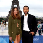 PARIS, FRANCE - JULY 26: Chrissy Teigen and John Legend attend the red carpet ahead of the opening ceremony of the Olympic Games Paris 2024 on July 26, 2024 in Paris, France. (Photo by Matthew Stockman/Getty Images)