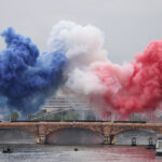 PARIS, FRANCE - JULY 26: Smoke resembling the flag of Team France is shown over Pont d’Austerlitz during the opening ceremony of the Olympic Games Paris 2024 on July 26, 2024 in Paris, France. (Photo by Lars Baron/Getty Images)