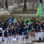 PARIS, FRANCE - JULY 26: Athletes of Team Brazil are seen on a boat on the River Seine during the opening ceremony of the Olympic Games Paris 2024 on July 26, 2024 in Paris, France. (Photo by Buda Mendes/Getty Images)