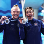 PARIS, FRANCE - JULY 27: Silver Medalists, Sarah Bacon and Kassidy Cook of Team United States pose with their medals after the Medal Ceremony after competing in the Women's Synchronised 3m Springboard Final on day one of the Olympic Games Paris 2024 at Aquatics Centre on July 27, 2024 in Paris, France. (Photo by Sarah Stier/Getty Images)