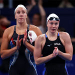 NANTERRE, FRANCE - JULY 27: Abbey Weitzeil and Erika Connolly  of Team United States react during the Women's 4x100m Freestyle Relay Heats on day one of the Olympic Games Paris 2024 at Paris La Defense Arena on July 27, 2024 in Nanterre, France. (Photo by Maddie Meyer/Getty Images)