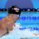 NANTERRE, FRANCE - JULY 27: Nic Fink of Team United States competes in the Men's 100m Breaststroke Semifinals on day one of the Olympic Games Paris 2024 at Paris La Defense Arena on July 27, 2024 in Nanterre, France. (Photo by Sarah Stier/Getty Images)