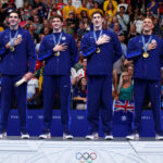 NANTERRE, FRANCE - JULY 27: Gold Medalists, Jack Alexy, Chris Guiliano, Hunter Armstrong and Caeleb Dressel of Team United States pose with their medals during the Medal Ceremony after the Men's 4x100m Freestyle Relay Final on day one of the Olympic Games Paris 2024 at Paris La Defense Arena on July 27, 2024 in Nanterre, France. (Photo by Maddie Meyer/Getty Images)