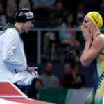 NANTERRE, FRANCE - JULY 27: Katie Ledecky of Team United States and Ariarne Titmus of Team Australia react as they place their belongings down prior to the Women's 400m Freestyle Final on day one of the Olympic Games Paris 2024 at Paris La Defense Arena on July 27, 2024 in Nanterre, France. (Photo by Maddie Meyer/Getty Images)