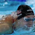 NANTERRE, FRANCE - JULY 27:  Gretchen Walsh of Team United States competes in the Women's 100m Butterfly Semifinals on day one of the Olympic Games Paris 2024 at Paris La Defense Arena on July 27, 2024 in Nanterre, France.  (Photo by Al Bello/Getty Images)