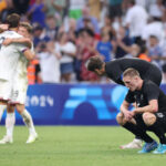 MARSEILLE, FRANCE - JULY 27:  Finn Surman and Matthew Garbett of Team New Zealand look dejected after the Men's group A match between New Zealand and United States during the Olympic Games Paris 2024 at Stade de Marseille on July 27, 2024 in Marseille, France. (Photo by Alex Livesey/Getty Images)