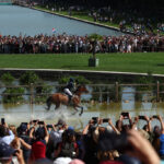 VERSAILLES, FRANCE - JULY 28: A general view as Karim Florent Laghouag and horse Triton Fontaine of Team France compete during the Equestrian Eventing Individual Cross Country leg on day two of the Olympic Games Paris 2024 at Chateau de Versailles on July 28, 2024 in Versailles, France. (Photo by Mike Hewitt/Getty Images)