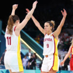 LILLE, FRANCE - JULY 28: Queralt Casas #9 of Team Spain and Leonor Rodriguez #11 of Team Spain celebrate victory during the Women's Group Phase - Group A match between People's Republic of China and Team Spain during day two of the Olympic Games Paris 2024 at Stade Pierre Mauroy on July 28, 2024 in Lille, France. (Photo by Gregory Shamus/Getty Images)