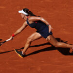 PARIS, FRANCE - JULY 28: Jessica Pegula of Team United States plays a backhand against Viktorija Golubic of Team Switzerland during the Women’s Singles first round match on day two of the Olympic Games Paris 2024 at Roland Garros on July 28, 2024 in Paris, France. (Photo by Matthew Stockman/Getty Images)