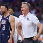 LILLE, FRANCE - JULY 28: Team United States coach Steve Kerr reacts to a play during the first half of the Men's Group Phase - Group C game between Serbia and the United States on day two of the Olympic Games Paris 2024 at Stade Pierre Mauroy on July 28, 2024 in Lille, France. (Photo by Gregory Shamus/Getty Images)