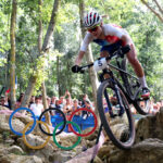 ELANCOURT, FRANCE - JULY 28: Loana Lecomte of Team France competes during the Women’s Cross-Country Cycling Mountain Bike Gold Medal race on day two of the Olympic Games Paris 2024 at Elancourt Hill on July 28, 2024 in Elancourt, France. (Photo by Jared C. Tilton/Getty Images)