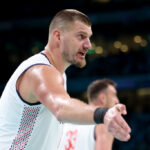 LILLE, FRANCE - JULY 28: Nikola Jokic #15 of Team Serbia reacts to a play during the second half of the Men's Group Phase - Group C game between Serbia and the United States on day two of the Olympic Games Paris 2024 at Stade Pierre Mauroy on July 28, 2024 in Lille, France. (Photo by Gregory Shamus/Getty Images)