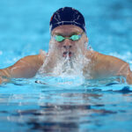 NANTERRE, FRANCE - JULY 28: Leon Marchand of Team France competes in the Men’s 400m Individual Medley Final on day two of the Olympic Games Paris 2024 at Paris La Defense Arena on July 28, 2024 in Nanterre, France. (Photo by Quinn Rooney/Getty Images)