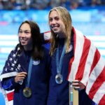 NANTERRE, FRANCE - JULY 28: Gold Medalist Torri Huske (L) and Silver Medalist Gretchen Walsh (R) of Team United States pose following the Swimming medal ceremony after the Women’s 100m Butterfly Final on day two of the Olympic Games Paris 2024 at Paris La Defense Arena on July 28, 2024 in Nanterre, France. (Photo by Sarah Stier/Getty Images)