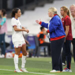 MARSEILLE, FRANCE - JULY 28: Emma Hayes, Head Coach of Team United States talks to Mallory Swanson #9 of Team United States during the Women's group B match between United States and Germany during the Olympic Games Paris 2024 at Stade de Marseille on July 28, 2024 in Marseille, France. (Photo by Alex Livesey/Getty Images)