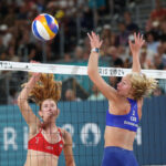 PARIS, FRANCE - JULY 28: Kelly Cheng of Team United States attacks the net against Marie-Sara Stochlova of Team Czechia during the Women's Preliminary Phase - Pool C match on day two of the Olympic Games Paris 2024 at Eiffel Tower Stadium on July 28, 2024 in Paris, France. (Photo by Cameron Spencer/Getty Images)