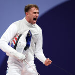 PARIS, FRANCE - JULY 29: Nick Itkin of Team United States celebrates his victory against Alex Tofalides of Team Cyprus (not pictured) in the Fencing Men's Foil Individual Table of 32 on day three of the Olympic Games Paris 2024 at Grand Palais on July 29, 2024 in Paris, France. (Photo by Al Bello/Getty Images)