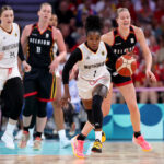 LILLE, FRANCE - JULY 29: Alexis Peterson #1 of Team Germany dribbles the ball during the Women's Group Phase - Group C match between Team Germany and Team Belgium on day three of the Olympic Games Paris 2024 at Stade Pierre Mauroy on July 29, 2024 in Lille, France. (Photo by Gregory Shamus/Getty Images)