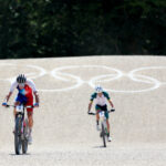 ELANCOURT, FRANCE - JULY 29: (L-R) Victor Koretzky of Team France sprint at finish line to win the silver medal ahead of Alan Hatherly of Team South Africa during the Men's Cross-Country on day three of the Olympic Games Paris 2024 at Elancourt Hill on July 29, 2024 in Elancourt, France. (Photo by Alex Broadway/Getty Images)