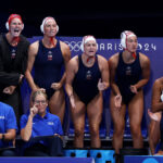 PARIS, FRANCE - JULY 29: Players of Team United States show their support during the Women's Preliminary Round - Group B match between Team United States and Team Spain on day three of the Olympic Games Paris 2024 at Aquatics Centre on July 29, 2024 in Paris, France. (Photo by Clive Rose/Getty Images)