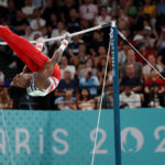 PARIS, FRANCE - JULY 29: Frederick Richard of Team United States competes on the high bar during the Artistic Gymnastics Men's Team Final on day three of the Olympic Games Paris 2024 at Bercy Arena on July 29, 2024 in Paris, France. (Photo by Jamie Squire/Getty Images)