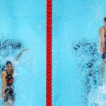 NANTERRE, FRANCE - JULY 29: Regan Smith of Team United States and Kylie Masse of Team Canada compete in the Women’s 100m Backstroke Semifinals on day three of the Olympic Games Paris 2024 at Paris La Defense Arena on July 29, 2024 in Nanterre, France. (Photo by Richard Heathcote/Getty Images)