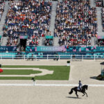 VERSAILLES, FRANCE - JULY 30: A general view as Corentin Pottier and horse Gotilas Du Feuillard of Team France compete in the Dressage Grand Prix Team and Individual Qualifier on day four of the Olympic Games Paris 2024 at Chateau de Versailles on July 30, 2024 in Versailles, France. (Photo by Mike Hewitt/Getty Images)