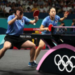 PARIS, FRANCE - JULY 30: Lim Jonghoom and Shin Yubin of Team South Korea compete during the Bronze Medal match between Team Republic of Korea and Team Hong Kong on day four of the Olympic Games Paris 2024 at South Paris Arena on July 30, 2024 in Paris, France. (Photo by Jared C. Tilton/Getty Images)