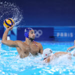 PARIS, FRANCE - JULY 30: Alexandre Bouet of Team France shoots during the Men's Preliminary Round Group B match between Team Japan and Team France on day four of the Olympic Games Paris 2024 at Aquatics Centre on July 30, 2024 in Paris, France. (Photo by Clive Rose/Getty Images)