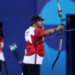 PARIS, FRANCE - JULY 30: Eric Peters of Team Canada during the Archery Men's Individual 1/16 contest against Dhiraj Bommadevara of Team India on day four of the Olympic Games Paris 2024 at Esplanade Des Invalides on July 30, 2024 in Paris, France. (Photo by Julian Finney/Getty Images)