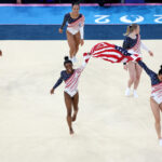 PARIS, FRANCE - JULY 30: (L-R) Jordan Chiles, Hezly Rivera,  Simone Biles, Jade Carey and Sunisa Lee of Team United States celebrate winning the gold medals during the Artistic Gymnastics Women's Team Final on day four of the Olympic Games Paris 2024 at Bercy Arena on July 30, 2024 in Paris, France. (Photo by Ezra Shaw/Getty Images)