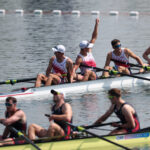 PARIS, FRANCE - AUGUST 01: Nick Mead, Justin Best, Michael Grady and Liam Corrigan of Team United States (top) celebrate winning the gold medals after competing in the Rowing Men's Four Final A on day six of the Olympic Games Paris 2024 at Vaires-Sur-Marne Nautical Stadium on August 01, 2024 in Paris, France. (Photo by Justin Setterfield/Getty Images)