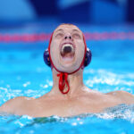 PARIS, FRANCE - AUGUST 01: Nic Porter of Team Australia celebrates in the Men's Preliminary Round - Group B match between Team France and Team Australia on day six of the Olympic Games Paris 2024 at Aquatics Centre on August 01, 2024 in Paris, France. (Photo by Clive Rose/Getty Images)