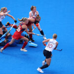 PARIS, FRANCE - AUGUST 01: Sophie Hamilton of Team Great Britain (L)scores her team's first goal during the Women's Pool B match between United States and Great Britain on day six of the Olympic Games Paris 2024 at Stade Yves Du Manoir on August 01, 2024 in Paris, France. (Photo by Alex Pantling/Getty Images)