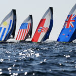 MARSEILLE, FRANCE - AUGUST 01: (L-R)  Hernan Umpierre and Fernando Diz of Team Uruguay, Ian Barrows and Hans Henken of Team United States of America, Sime Fantela and Mihovil Fantela of Team Croatia and Isaac Mchardie and William Mckenzie of Team New Zealand  during the Men's Skiff Men's Skiff 49er class Medal Race on day six of the Olympic Games Paris 2024 at Marseille Marina on August 01, 2024 in Marseille, France. (Photo by Clive Mason/Getty Images)