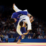 PARIS, FRANCE - AUGUST 01: Zelym Kotsoiev of Team Azerbaijan (white) and Ilia Sulamanidze of Team Georgia compete during the Judo Men -100 kg Final on day six of the Olympic Games Paris 2024 at Champs-de-Mars Arena on August 01, 2024 in Paris, France. (Photo by Sarah Stier/Getty Images)