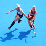 PARIS, FRANCE - AUGUST 01: Sophie Hamilton of Team Great Britain battles for possession with Leah Crouse of Team United States during the Women's Pool B match between United States and Great Britain on day six of the Olympic Games Paris 2024 at Stade Yves Du Manoir on August 01, 2024 in Paris, France. (Photo by Alex Pantling/Getty Images)