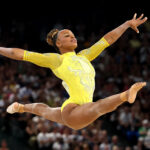 PARIS, FRANCE - AUGUST 01: Rebeca Andrade of Team Brazil competes in the floor exercise during the Artistic Gymnastics Women's All-Around Final on day six of the Olympic Games Paris 2024 at Bercy Arena on August 01, 2024 in Paris, France. (Photo by Jamie Squire/Getty Images)