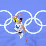 PARIS, FRANCE - AUGUST 01: (EDITORS NOTE: Image was captured using a robotic camera positioned above the field of play.) Amelie Rotar #88 of Team France serves during a Women's Preliminary Round match against Team People’s Republic of China  on day six of the Olympic Games Paris 2024 at Paris Arena on August 01, 2024 in Paris, France. (Photo by Jared C. Tilton/Getty Images)