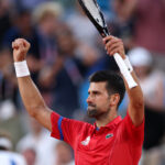 PARIS, FRANCE - AUGUST 01: Novak Djokovic of Team Serbia celebrates after winning match point against Stefanos Tsitsipas of Team Greece during the Men's Singles Quarter-final match on day six of the Olympic Games Paris 2024 at Roland Garros on August 01, 2024 in Paris, France.(Photo by Matthew Stockman/Getty Images)