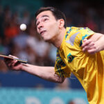 PARIS, FRANCE - AUGUST 02: Hugo Calderano of Team Brazil serves against Truls Moregard of Team Sweden (not pictured) in the Men' Singles Semifinal on day seven of the Olympic Games Paris 2024 at South Paris Arena on August 02, 2024 in Paris, France. (Photo by Michael Reaves/Getty Images)