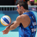 PARIS, FRANCE - AUGUST 02: Miles Evans of Team United States digs the ball during a Men's Preliminary Phase match on day seven of the Olympic Games Paris 2024 at Eiffel Tower Stadium on August 02, 2024 in Paris, France. (Photo by Elsa/Getty Images)