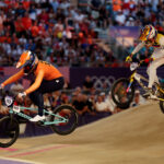 PARIS, FRANCE - AUGUST 02: Laura Smulders of Team Netherlands and Mariana Pajon Londono of Team Colombia compete during the Women's Semi-Finals Run 2, Heat 2 on day seven of the Olympic Games Paris 2024 at Saint-Quentin-en-Yvelines BMX Stadium on August 02, 2024 in Paris, France. (Photo by Tim de Waele/Getty Images)