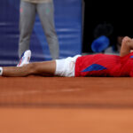 PARIS, FRANCE - AUGUST 02: Novak Djokovic of Team Serbia celebrates match point during the Tennis Men's Singles Semifinal match against Lorenzo Musetti of Team Italy on day seven of the Olympic Games Paris 2024 at Roland Garros on August 02, 2024 in Paris, France. (Photo by Clive Brunskill/Getty Images)