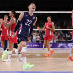 PARIS, FRANCE - AUGUST 02: Erik Shoji #22 of Team United States reacts after winning the Men's Preliminary Round - Pool C match between Team United States and Team Japan on day seven of the Olympic Games Paris 2024 at Paris Arena on August 02, 2024 in Paris, France. (Photo by Ezra Shaw/Getty Images)